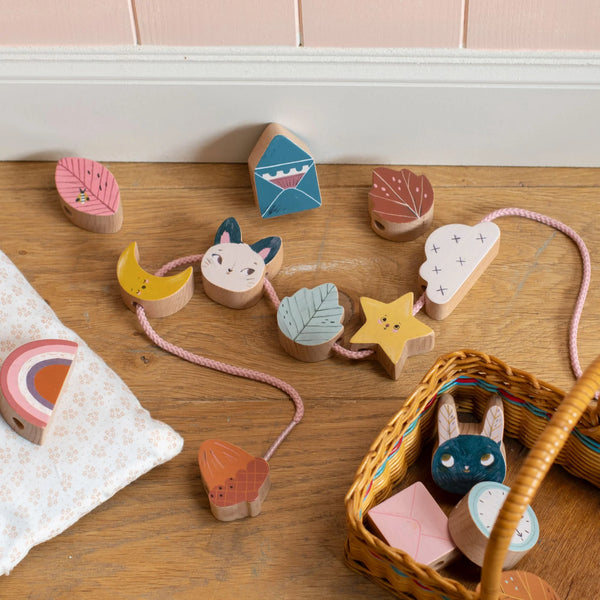 משחק עם 14 חרוזי עץ להשחלה, אחרי הגשם